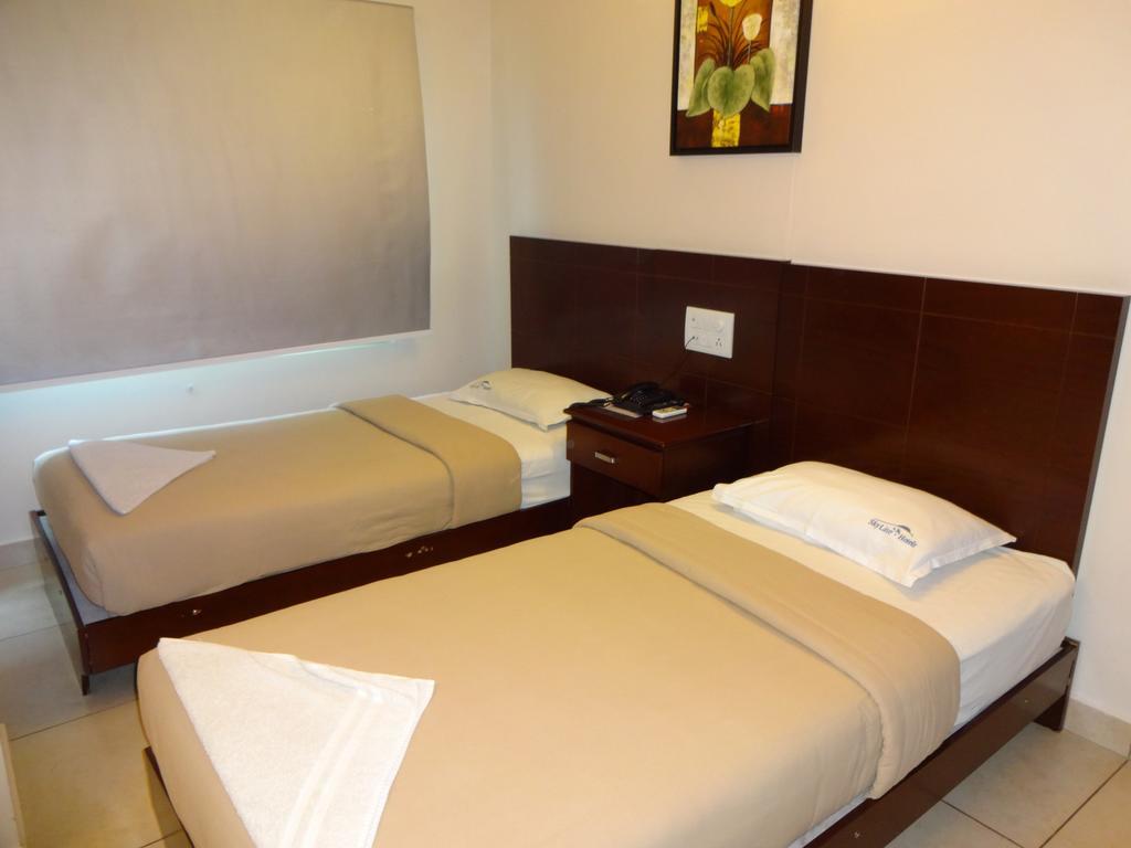 Hotel Sky Lite Coimbatore Bilik gambar